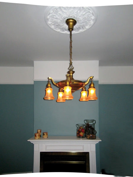 Vintage Lighting: Reviving an Antique Brass and Crystal Chandelier