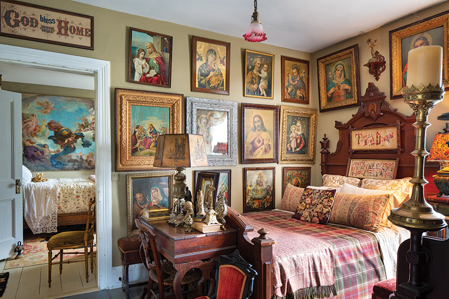 bedroom with religious pictures